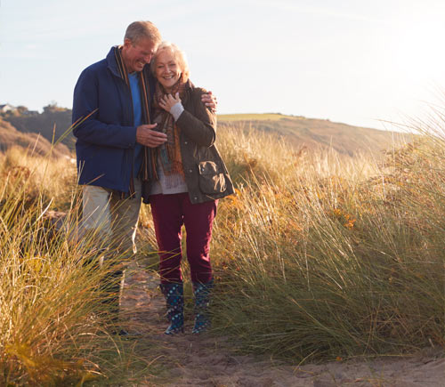 Couple walking on the beach