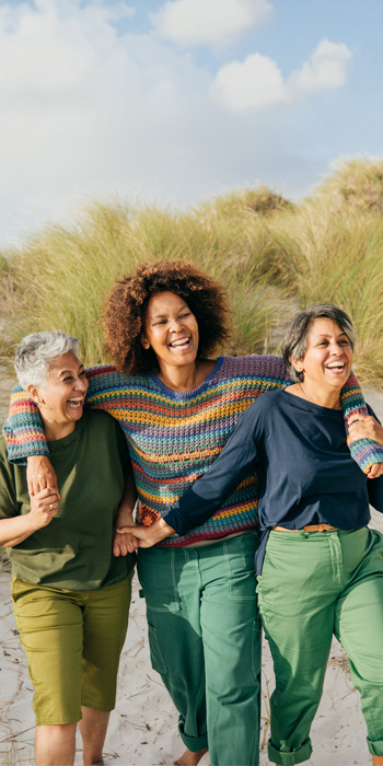 Three women laughing