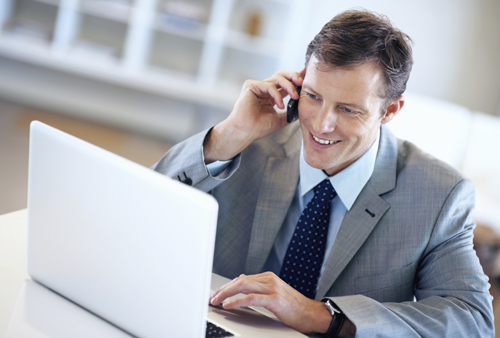 A man speaking on the phone