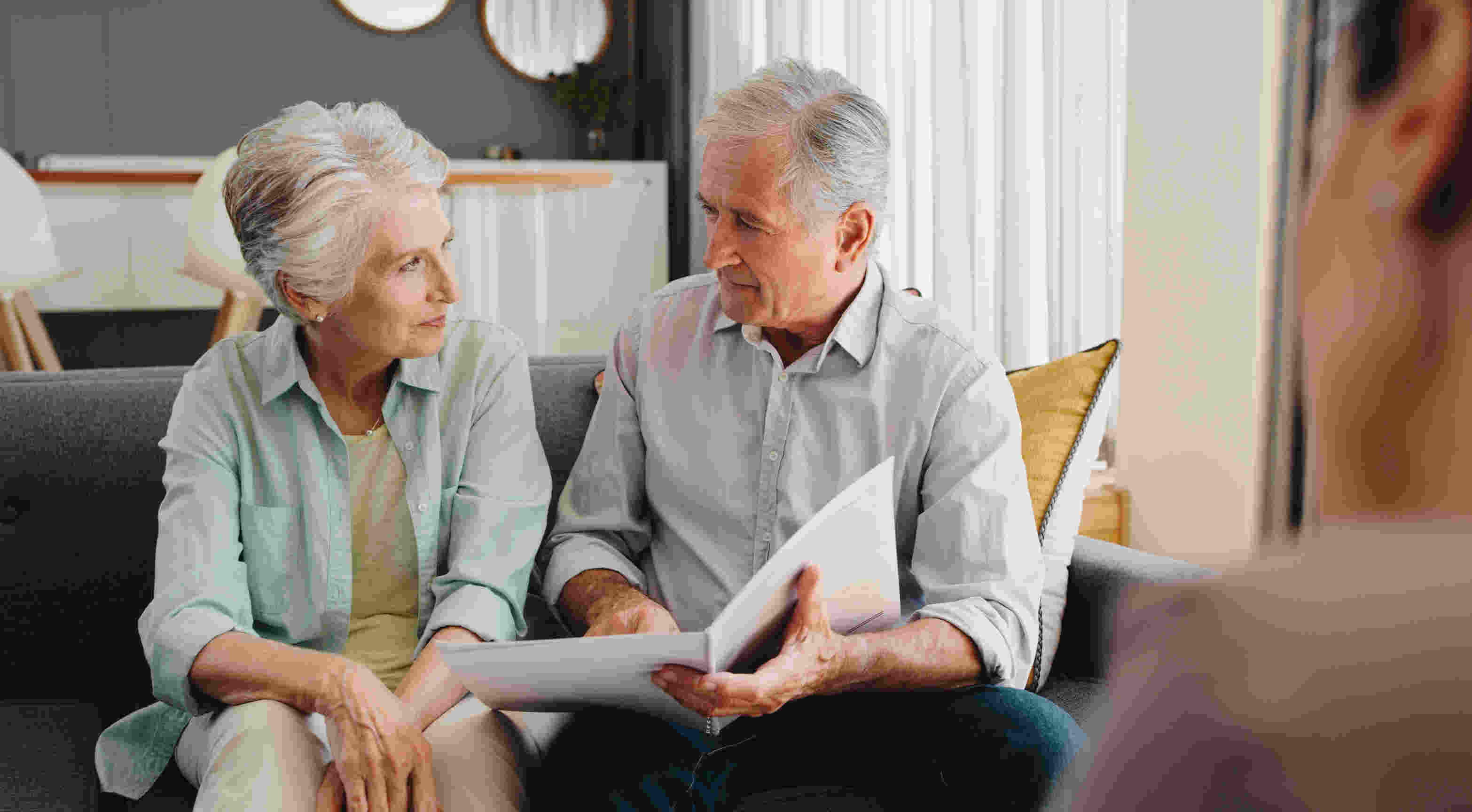 An older couple discussing finances