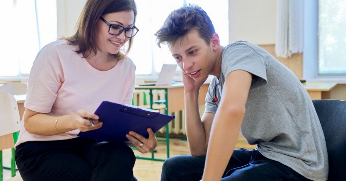 A mother discusses college with her teen son.