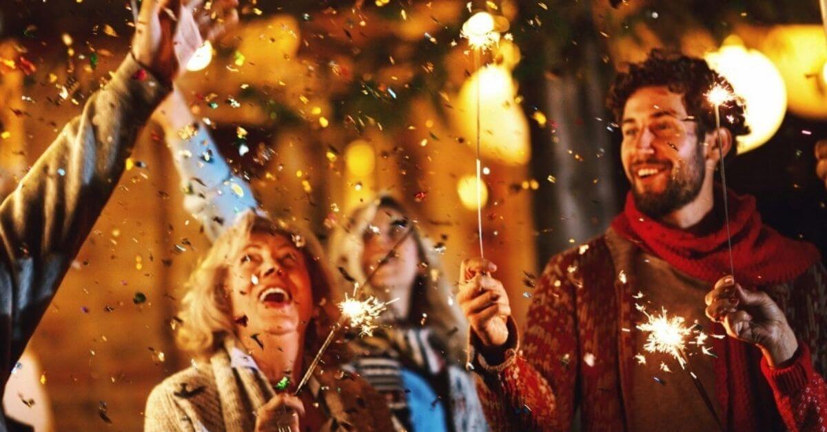 A family light sparklers for the New Year.