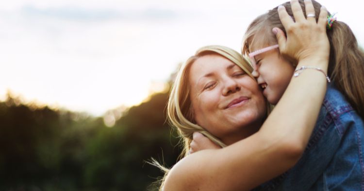 A mother and daughter spending time together outdoors