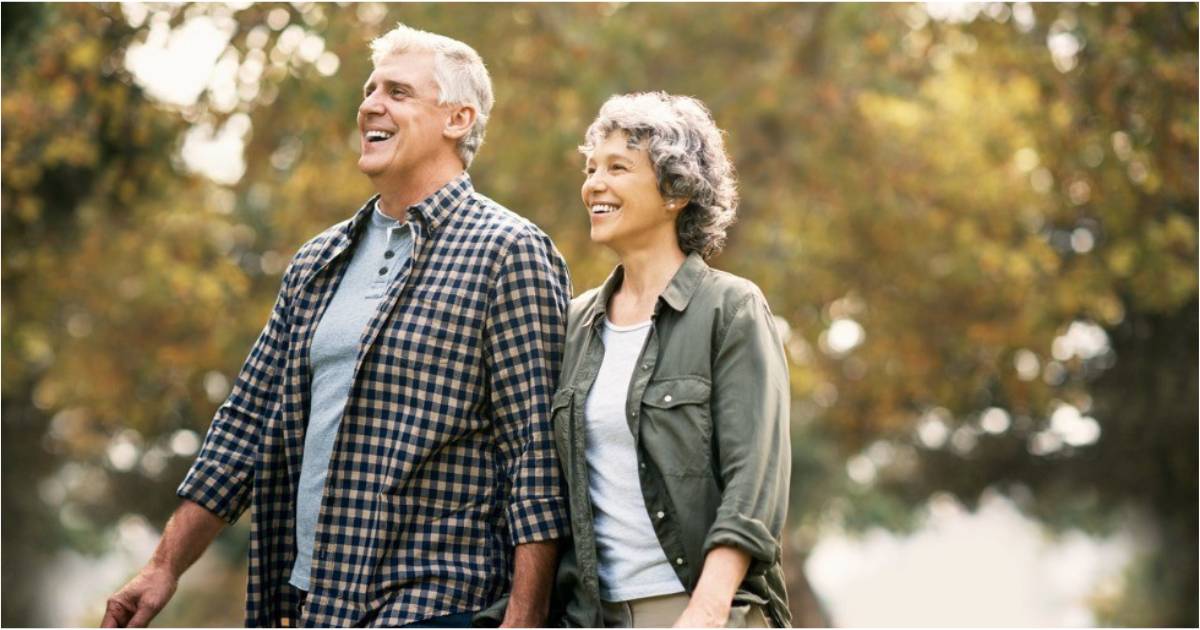 An older white couple enjoy their retirement in nature.