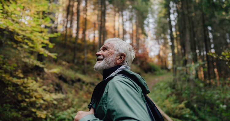 An older man going for a hike