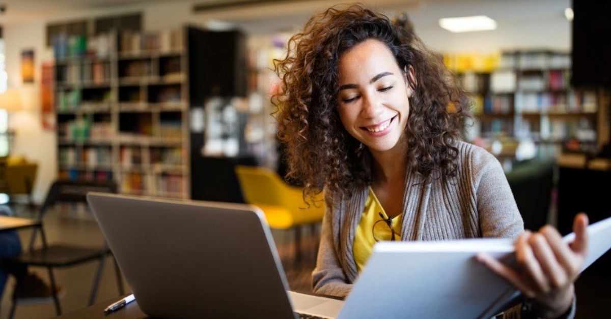 A young woman researching financial tips on her tablet